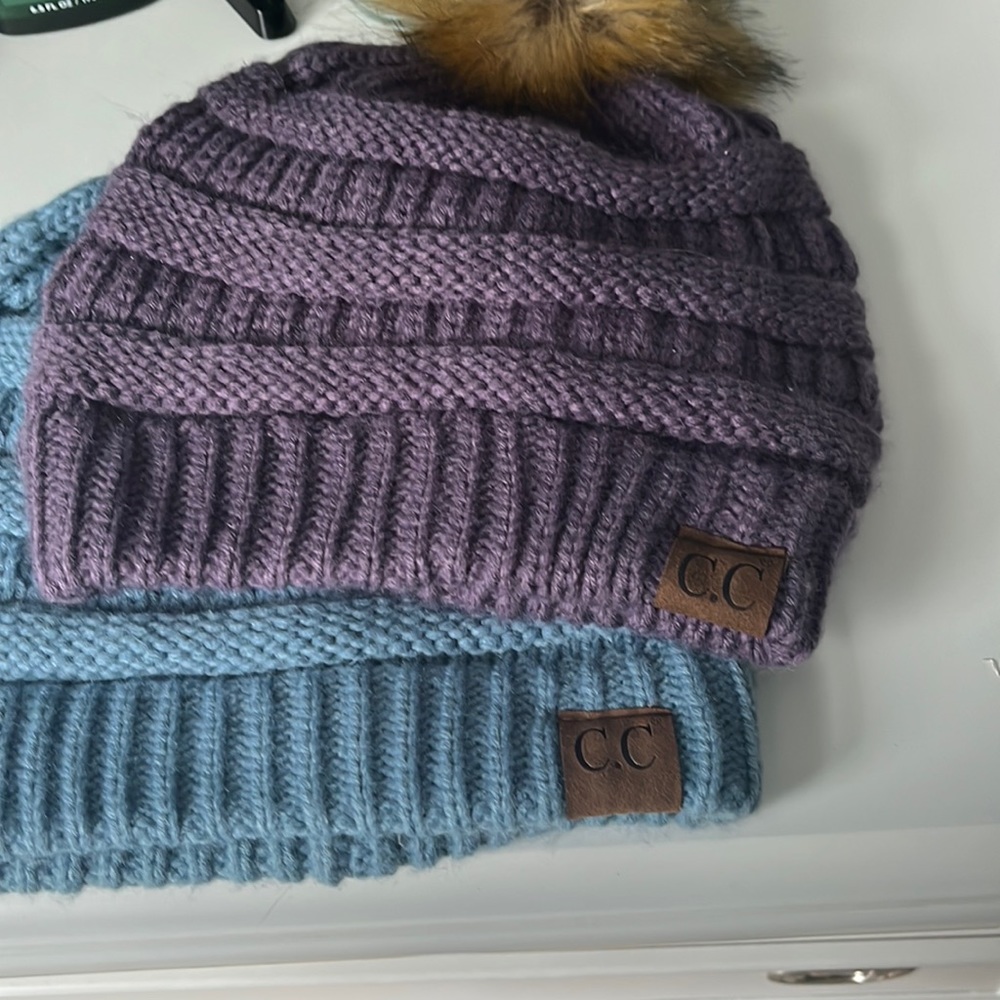 Two C.C. Beanies. Purple and blue.